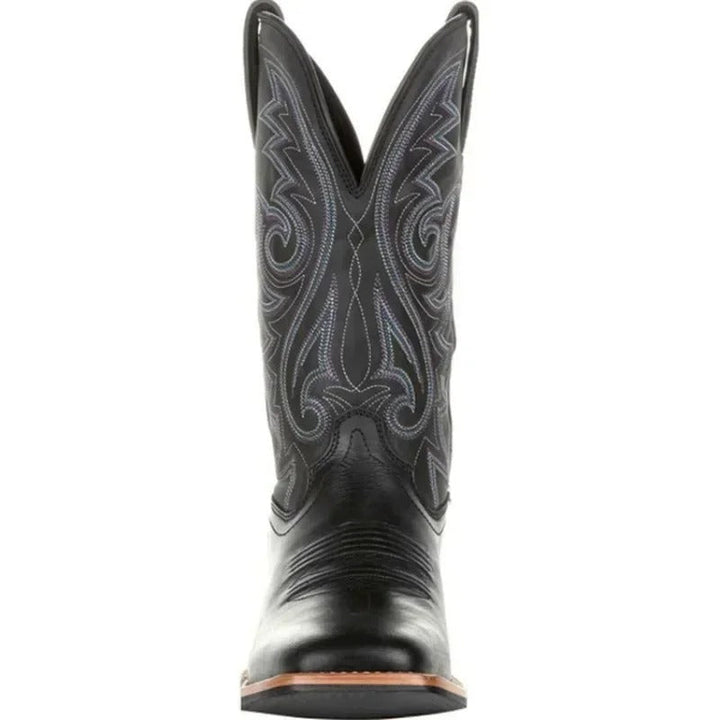Slitesterke svarte westernstøvler for menn. Robuste cowboystøvler med firkantet tå for langvarig motestil.