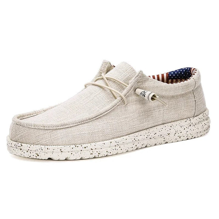 Elegant herre loafer med snøring, casual design og pustende materiale, perfekt for hverdagsbruk.