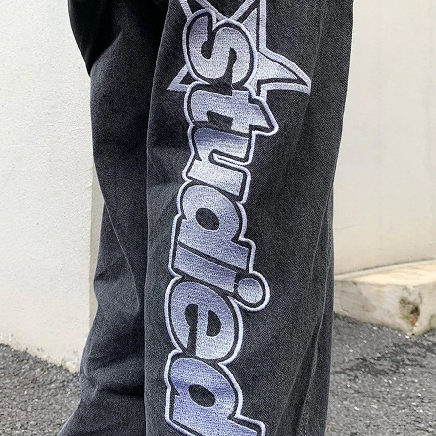 Baggy jeans for menn og kvinner, med trendy grafisk print og lav midje for casual stil.