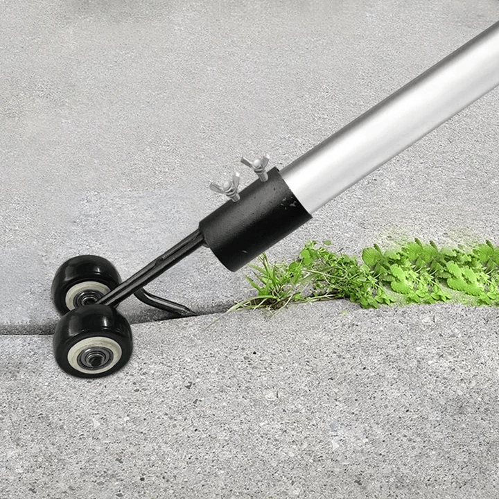 Manuell ugressfjerner: Effektivt hageverktøy for luking i blomsterbed.
