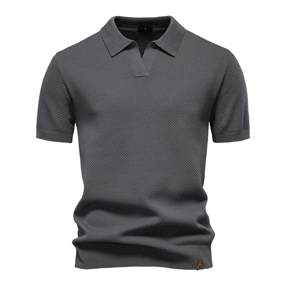 Stilfull herre poloskjorte, klassisk design med korte ermer. Ideell for fritid og en pen casual look.