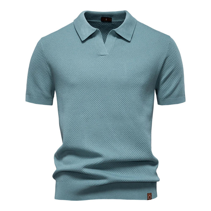 Premium herre poloskjorte med korte ermer. Høy kvalitet og elegant design for en sofistikert look.
