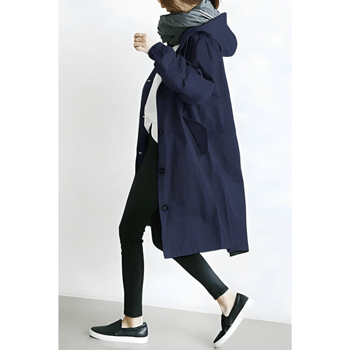 Allsidig oversized damekåpe for urban stil. Hette, knapper og løs passform for maksimal komfort.
