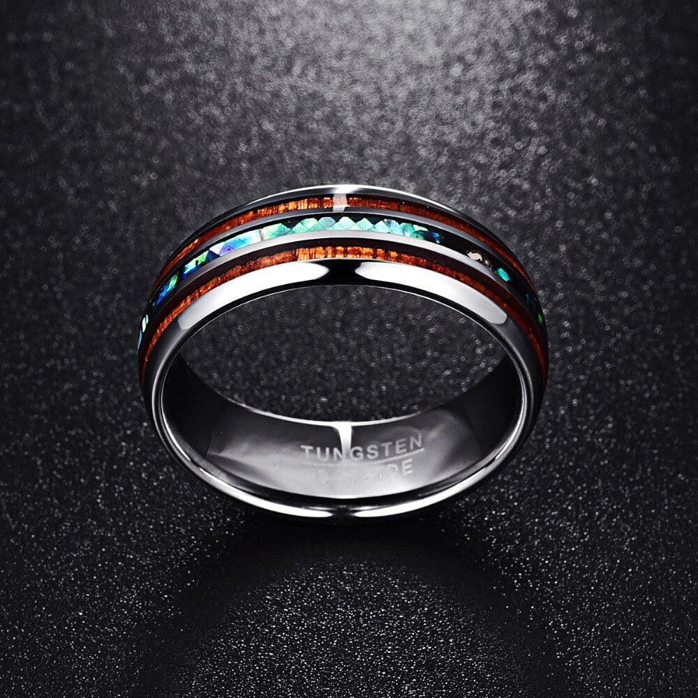Elegant forlovelsesring/løftering med Koa tre og iriserende abalone. Perfekt gave.