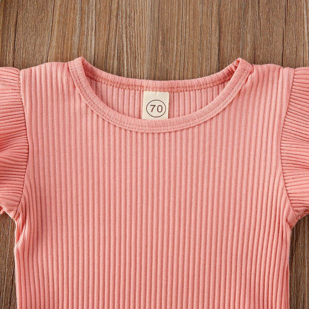 Komplett blomstret baby jente sommerantrekk med volang shorts, topp og pannebånd. Myke babyklær.