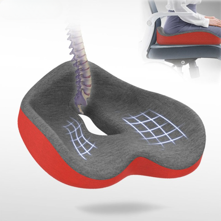 Ergonomisk sittepute for kontorstol, forebygger ryggsmerter og fremmer sunn sittestilling for menn.