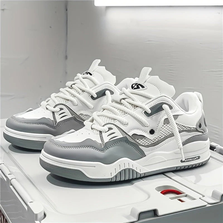 Sidevisning av menns moderne urbane sneakers, perfekte hverdagssko med god demping.