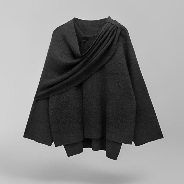 Elegant kvinners cape frakk for stilfulle høst- og vinterlag. Tidløst ytterplagg for motebevisste kvinner.