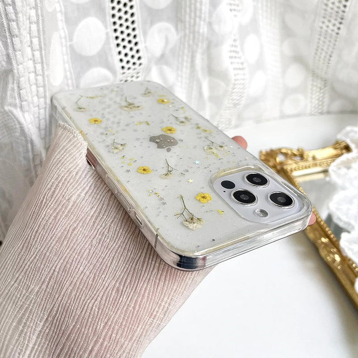 iPhone-deksel med fargerike pressede blomster: gul, lilla, rosa. Slitesterk mobilbeskyttelse med design.