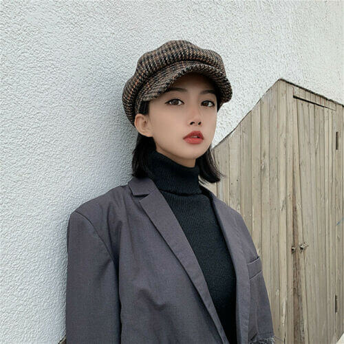 Mørkeblå Boston Scally Cap, en elegant kaps i klassisk stil med solbeskyttelse.