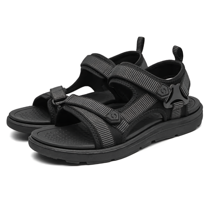 Fotvennlige sommersko i sort med ergonomisk design og støtdempende komfort, perfekt for lange dager ute.