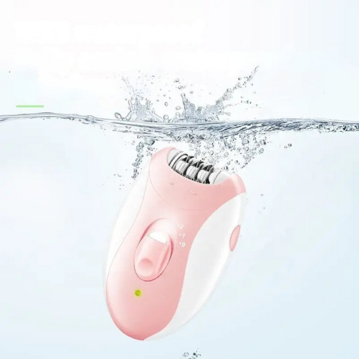 Kompakt epilator i bruk på kvinneben for effektiv og silkemyk hårfjerning, ideell for alle hudtyper.