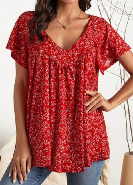 Stilig dame sommer V-hals topp med delikat blomstertrykk, perfekt for en frisk look.