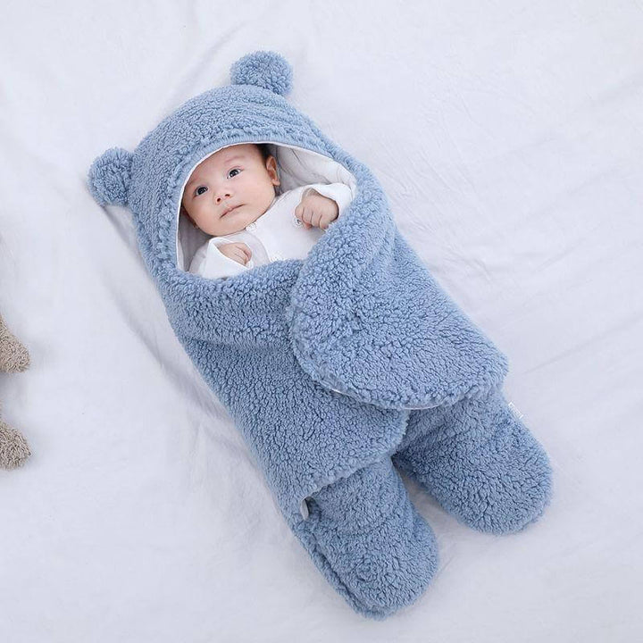 Naturlig ull sovepose for baby, holder den lille varm og trygg om natten.