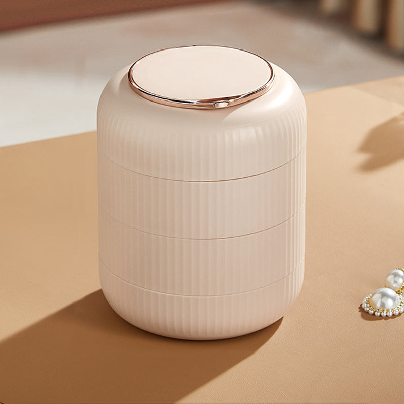 Kvinner elsker denne elegante roterende smykkeorganisatoren, som holder smykkene pent organisert.