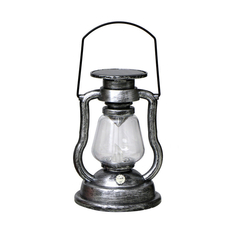 Robust rustfarget retro solcellelampe. LED flammeeffekt for langvarig utendørs bruk.
