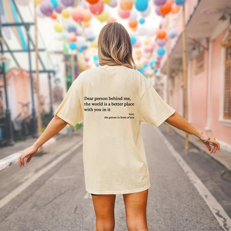 Kvinner i 'You Are Enough' t-skjorte, uttrykker styrke og positivitet.