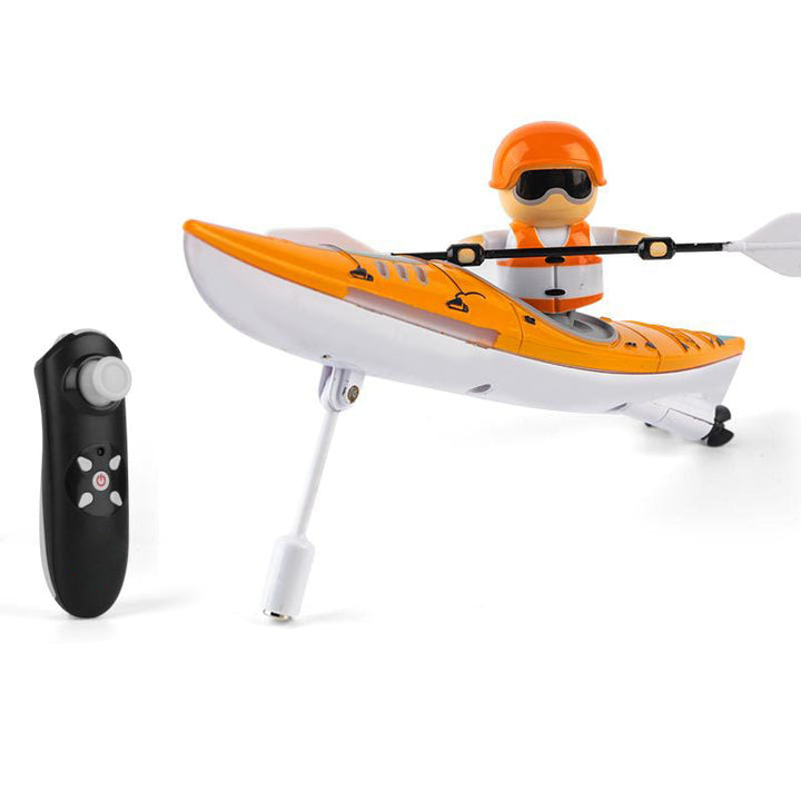Fargerik RC lekebåt for barn, klar til å skape glede i vannet.