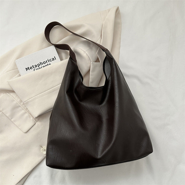 Allsidig brun PU veske, elegant messengerbag stil, ideell for hverdag og jobb.
