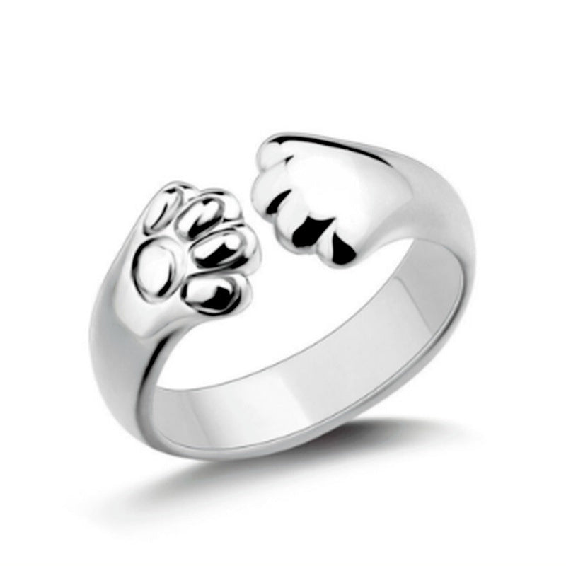 Unisex ring med justerbar størrelse og søtt dyrepoteavtrykk. En perfekt gave til dyrevenner.