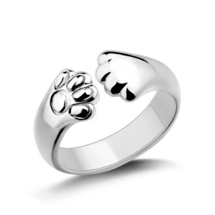 Unisex ring med justerbar størrelse og søtt dyrepoteavtrykk. En perfekt gave til dyrevenner.