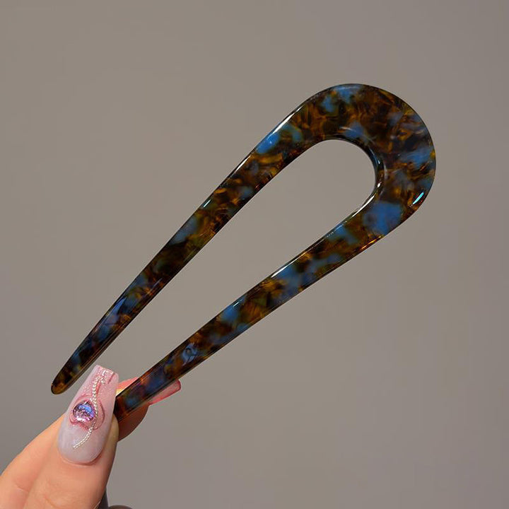 Elegant akryl U-hårnål for kvinner, det perfekte tilbehøret for en sofistikert håroppsats.