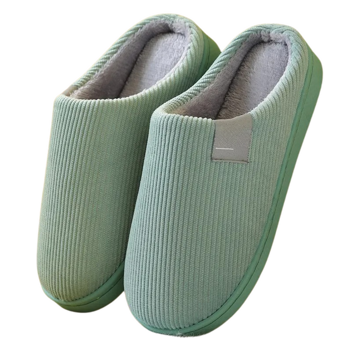 Komfortable unisex hjemmesko med termisk fôr, myk såle og sklisikker bunn. Ideell for kalde gulv.