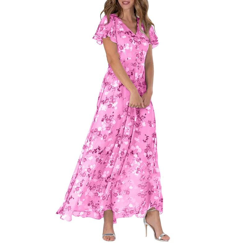 Vakker dame blomsterkjole med fargerikt mønster og sommerfuglsleeves. En luftig lang kjole.
