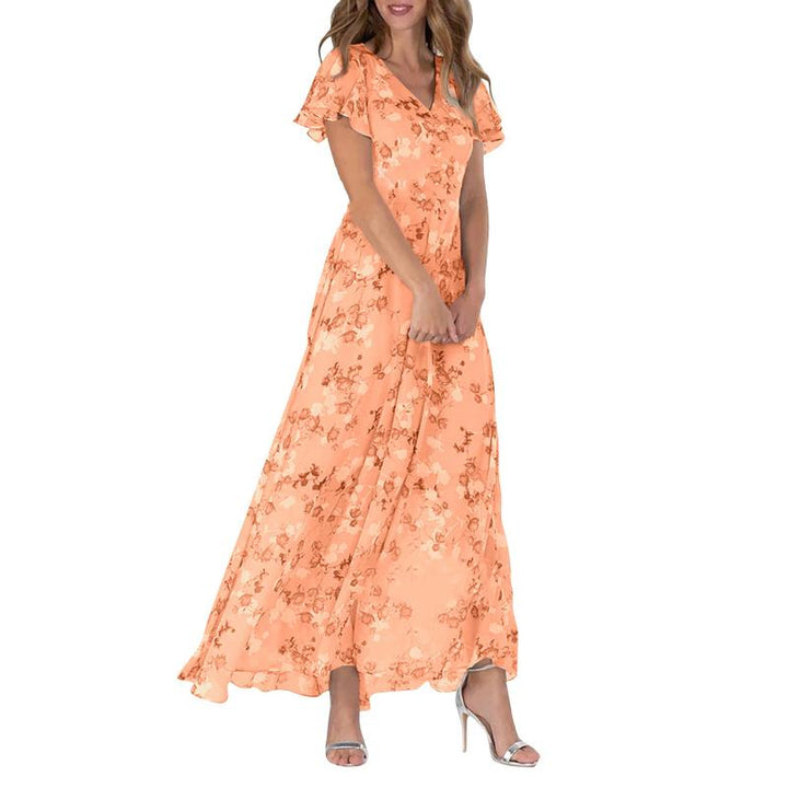 Maxikjole til dame med unike sommerfuglsleeves og vakkert blomstret mønster. Komfortabel og elegant.