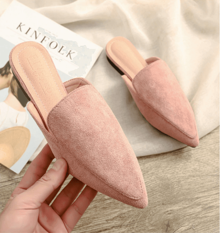 Stilige rosa spisse tå mulesko, komfortable kvinnesko som gir en elegant touch til ethvert antrekk.