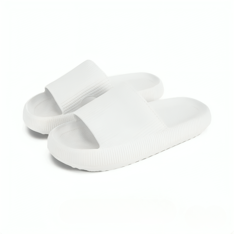 Vannavstøtende EVA skum tøfler, sklisikre. Ergonomisk og støtdempende design for unisex bruk.