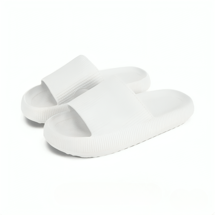Vannavstøtende EVA skum tøfler, sklisikre. Ergonomisk og støtdempende design for unisex bruk.