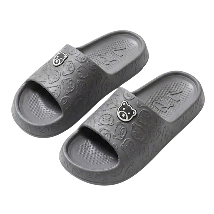 Komfortable og slitesterke unisex bjørnetøfler med lettvekt EVA-såle for hele dagen.
