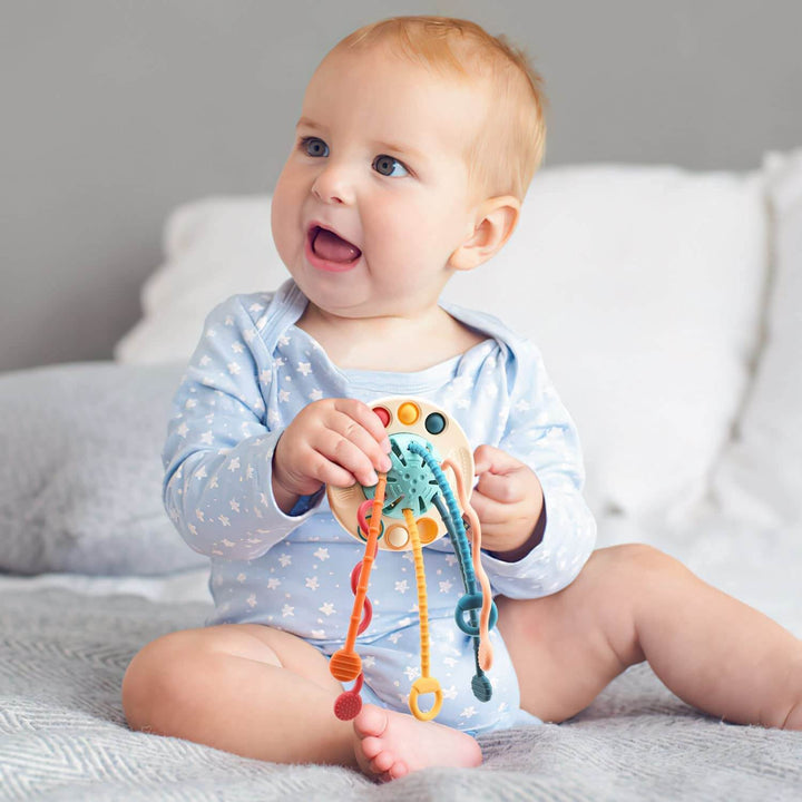 Flott gave til barn! Engasjerende UFO aktivitetsleke som utvikler babyens sanser og motoriske ferdigheter.