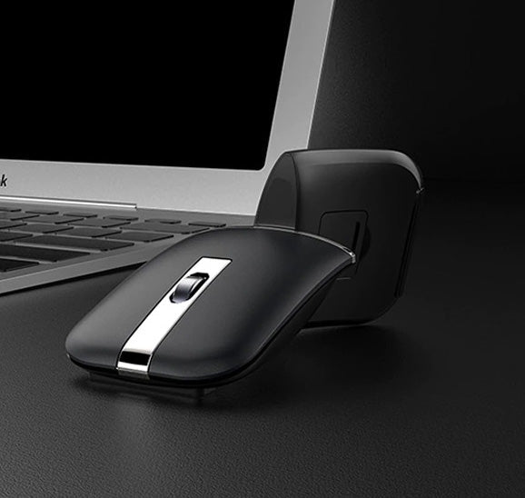 Produktivitet møter komfort: Grå/svart ergonomisk trådløs mus med roterbar design og stille klikk.