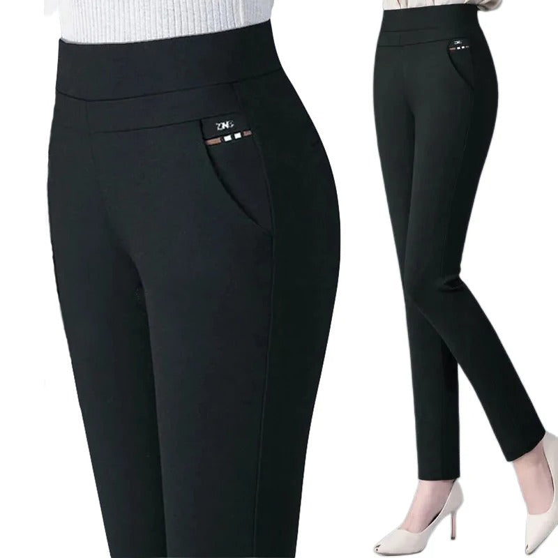 Svarte, slim fit vinterbukser for damer, designet for varme og stil.
