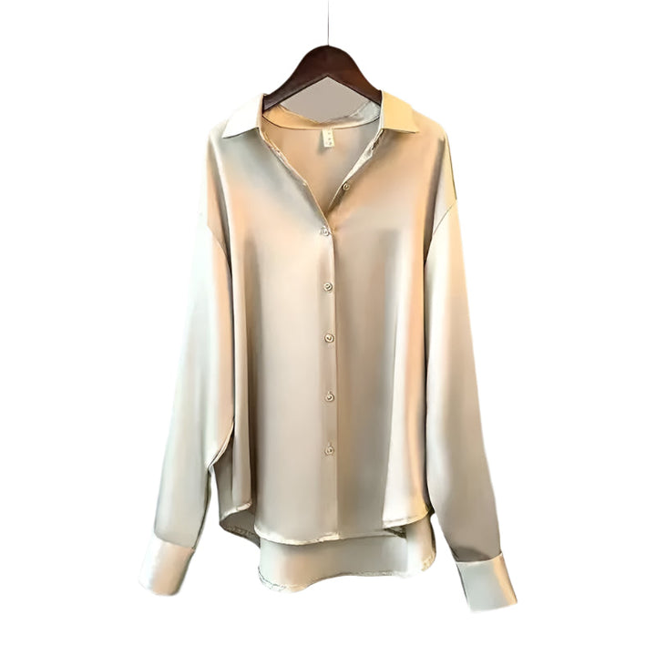Stilig damebluse i tidløs design med funksjonelle knapper. Perfekt for en elegant look.