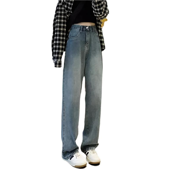 Svarte vintage jeans for damer med høy midje og vide ben, tidløs streetwear stil.