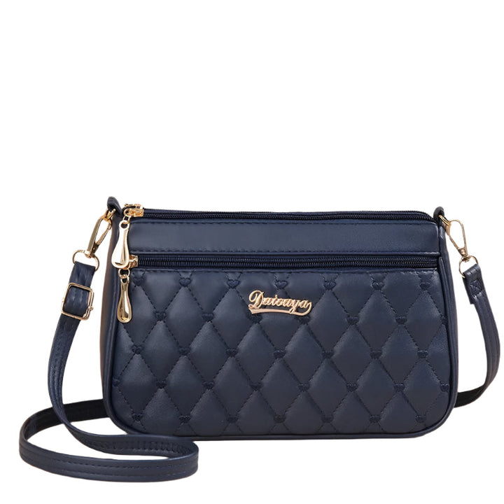 Grønn brodert crossbody veske i PU skinn, perfekt for å løfte ethvert hverdagsantrekk.