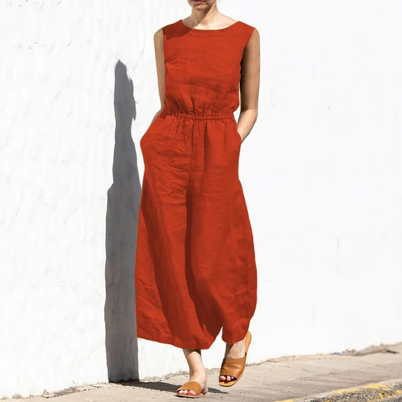Kvinner jumpsuit med vide ben og høy midje. Perfekt for komfortabel fritid eller en uformell fest.