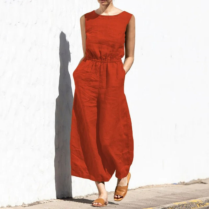 Kvinner jumpsuit med vide ben og høy midje. Perfekt for komfortabel fritid eller en uformell fest.