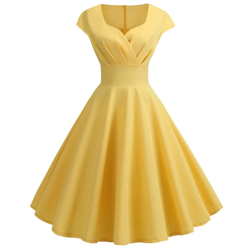 Behagelig rosa retro midikjole med V-hals for kvinner. Perfekt sommerkjole i vintage stil.