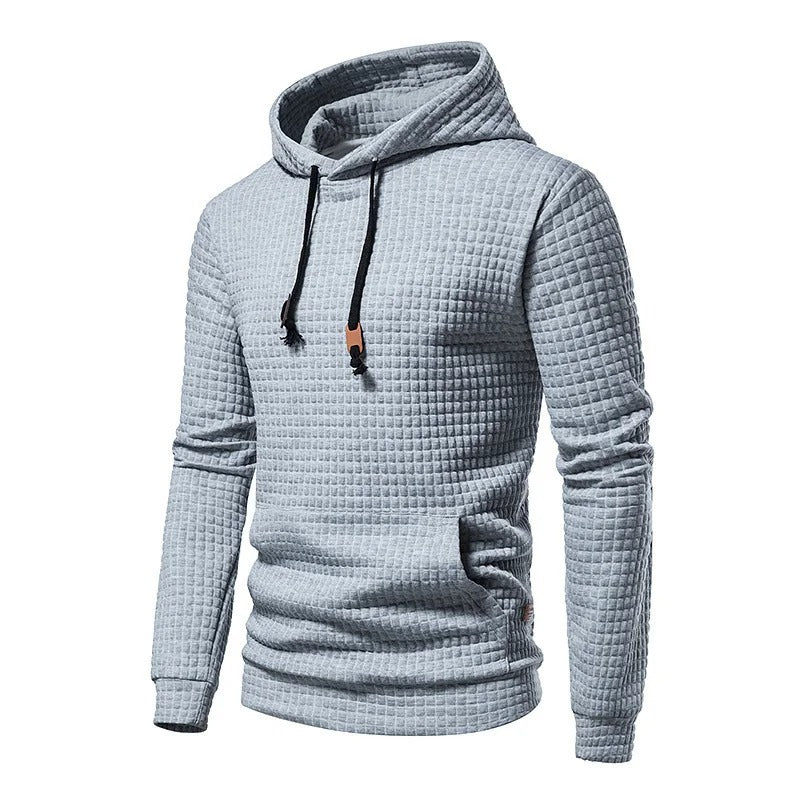 Komfortabel menns hettegenser i lappeteppe-stil. Pullover med justerbar snøring for en casual look.