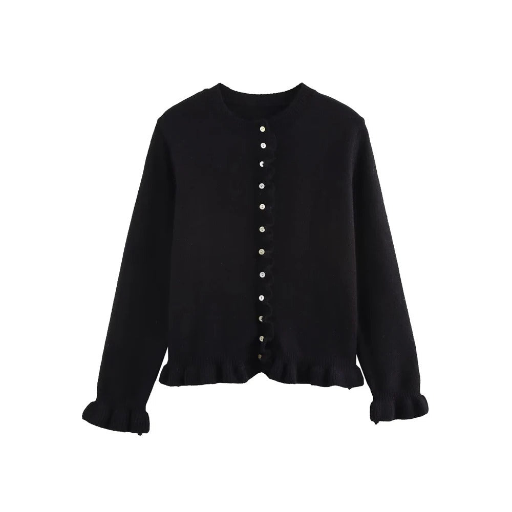 Damecardigan i teksturert strikk, ideell for helårsbruk. Allsidig og elegant overdel for en casual eller pen look.