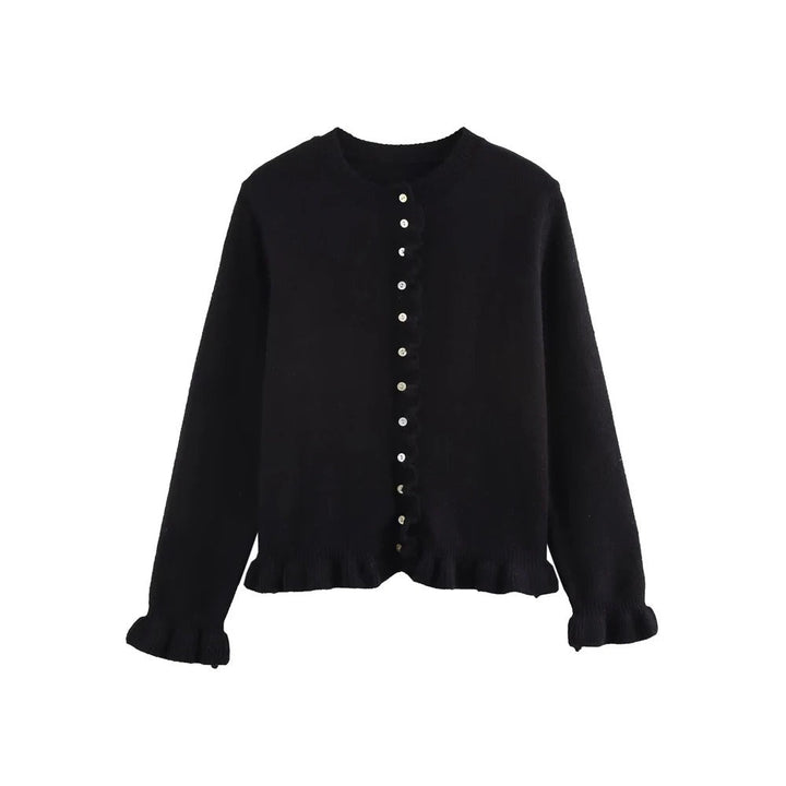 Damecardigan i teksturert strikk, ideell for helårsbruk. Allsidig og elegant overdel for en casual eller pen look.