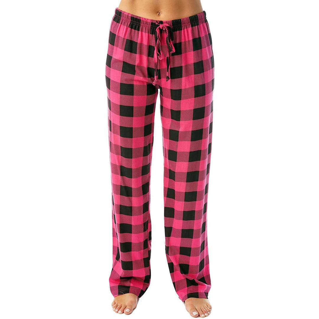 Sammenfoldet rutete pyjamasbukse, viser tekstur og kvalitet for dame. Pyjamasbukse.