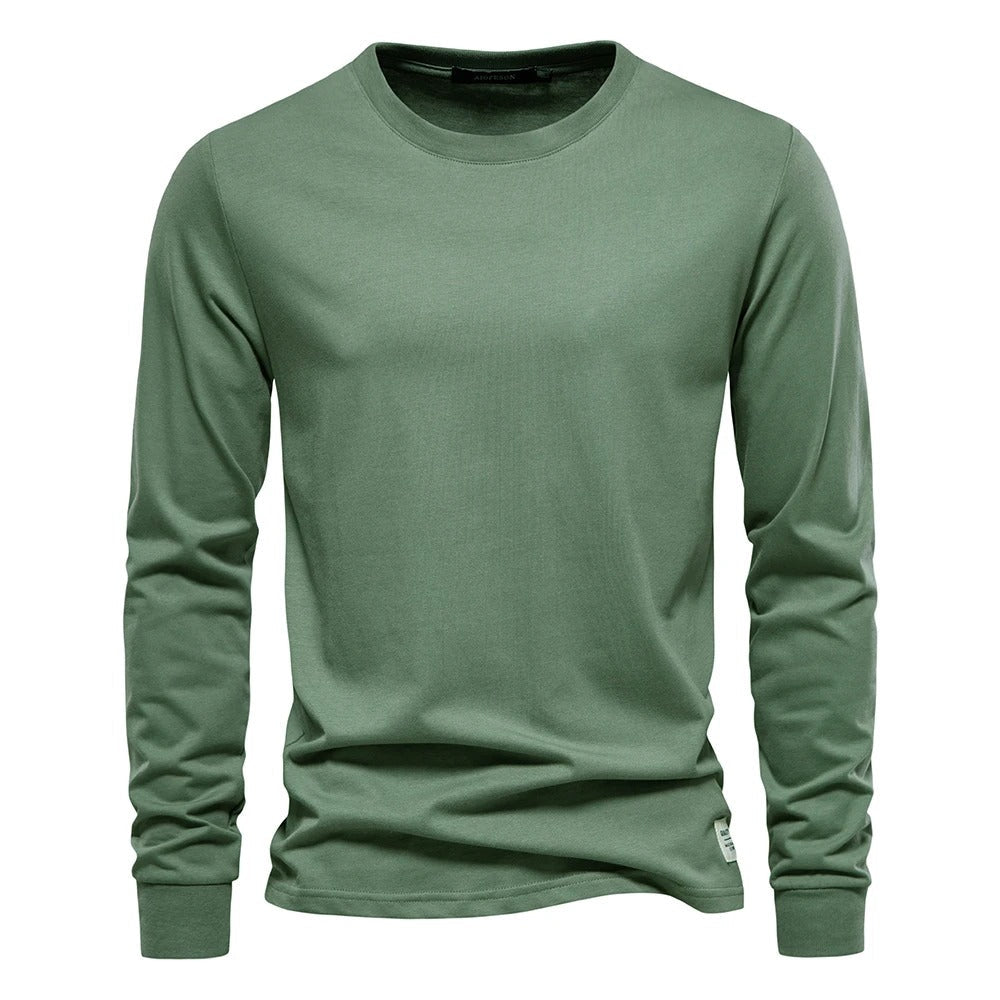 Komfortabel og allsidig langermet t-skjorte for menn, ensfarget design, egnet for alle anledninger.