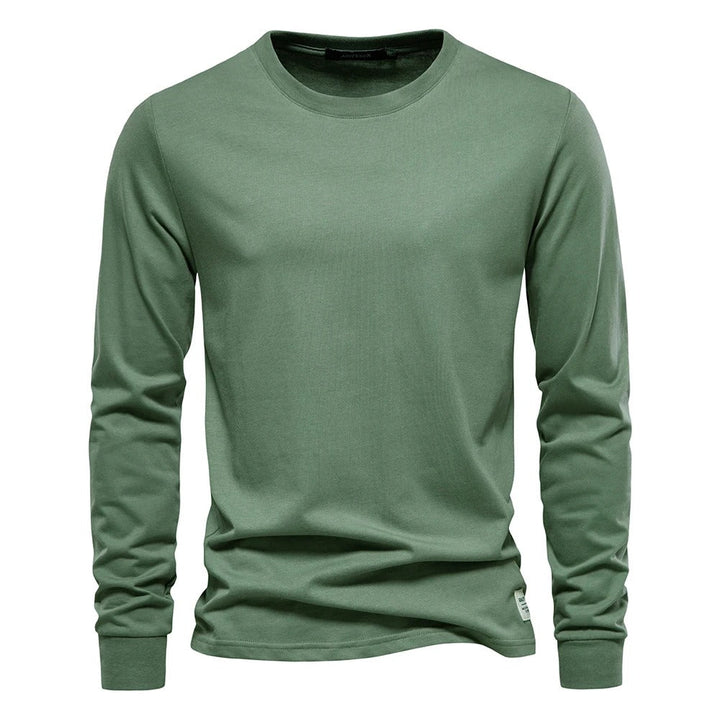 Komfortabel og allsidig langermet t-skjorte for menn, ensfarget design, egnet for alle anledninger.