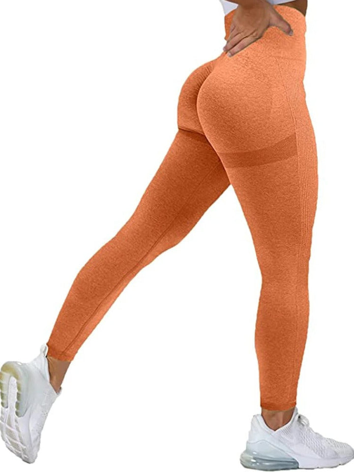 Kvinner yoga leggings med høy midje, gir god støtte under trening.