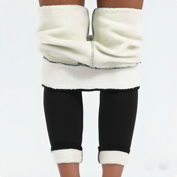 Isolerende dame leggings med høy midje for kuldebeskyttelse, perfekte som varmt basislag.